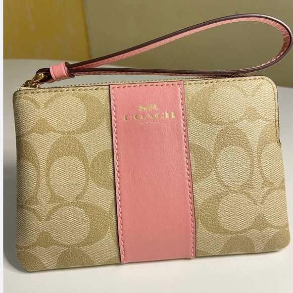 Coach Handbags - Coach Pink and Tan Signature Wristlet